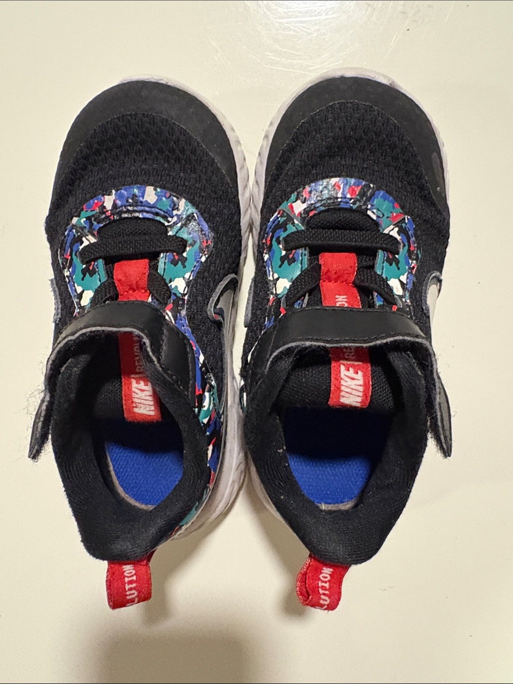 Nike Kids Black Sneakers with Red and Multicolor Accents